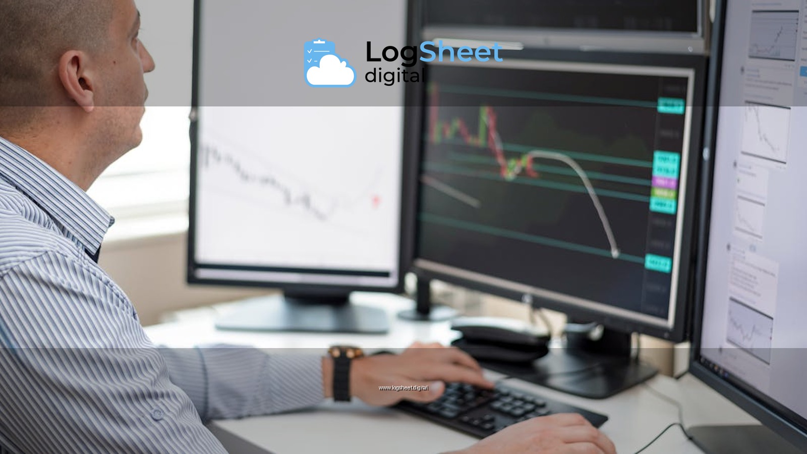 Businessman reviewing financial charts on multiple monitors in an office setting.