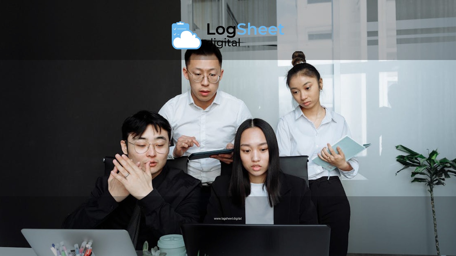 A diverse business team collaborates on projects in a modern office setting, using technology and notes.