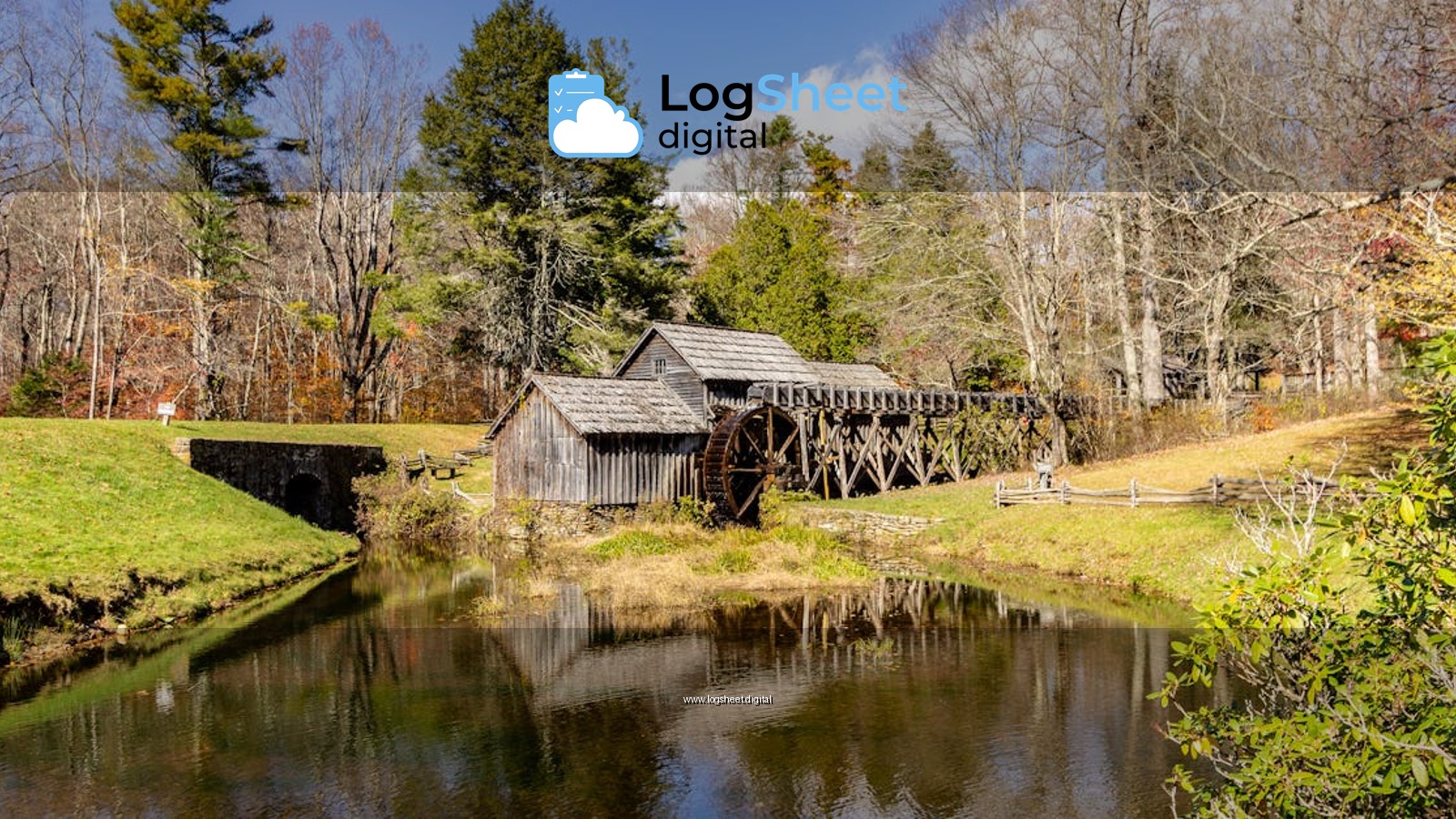Picturesque view of Mabry Mill reflecting in a pond surrounded by fall foliage in Meadows of Dan, Virginia.