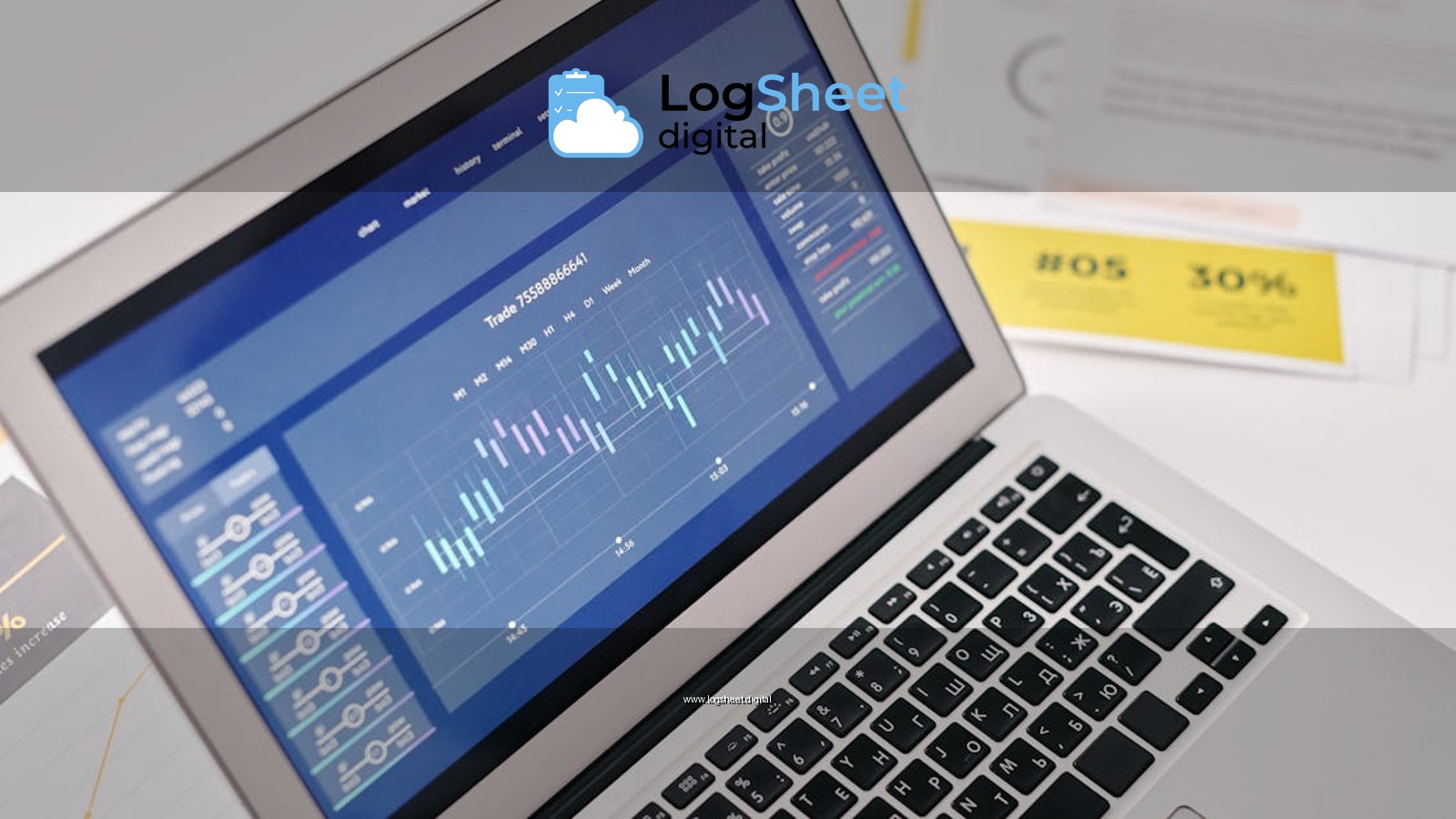 Open laptop displaying financial graphs and analytics with documents nearby, ideal for business presentations.