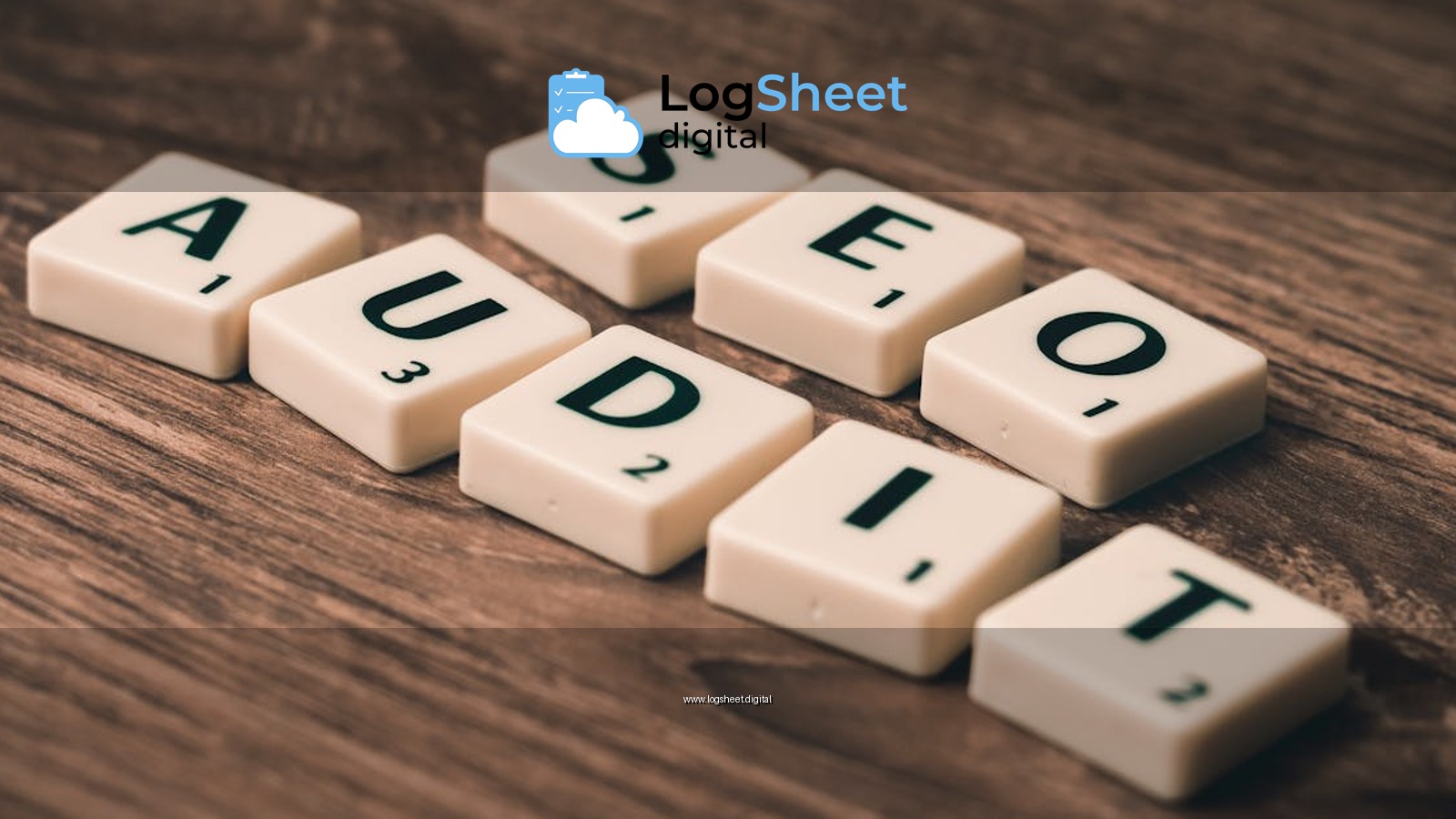 Scrabble tiles spelling SEO Audit on wooden surface, symbolizing digital marketing strategies.