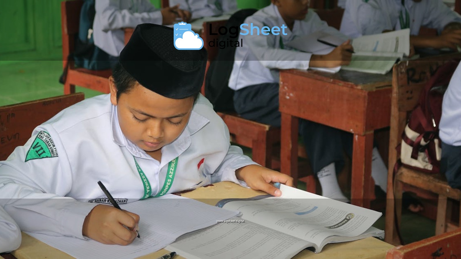 Students writing and studying in a focused classroom environment.