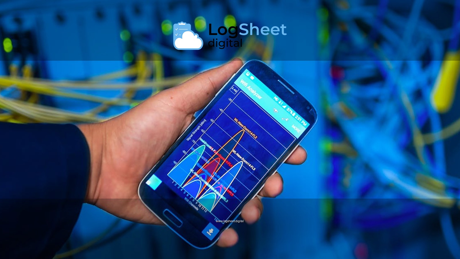 Hand holding smartphone displaying network analysis in high-tech server environment.