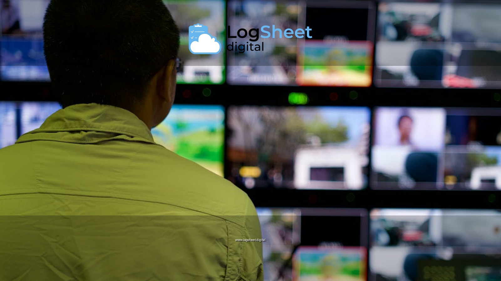 Man in a control room overseeing multiple monitors displaying various scenes.