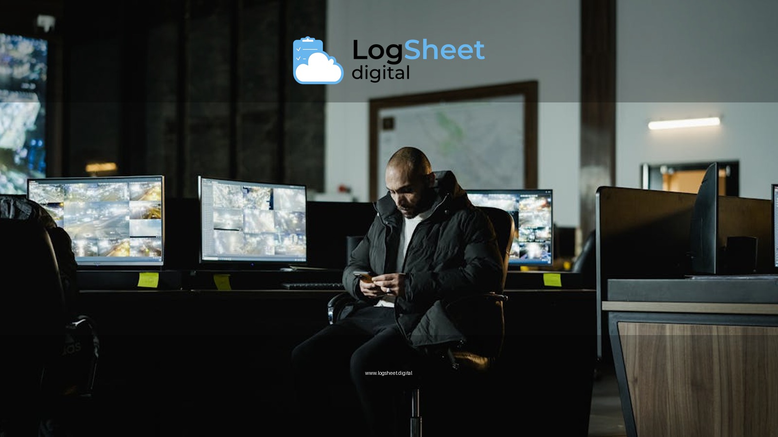 Security officer seated in a dimly lit control room, analyzing multiple surveillance screens.