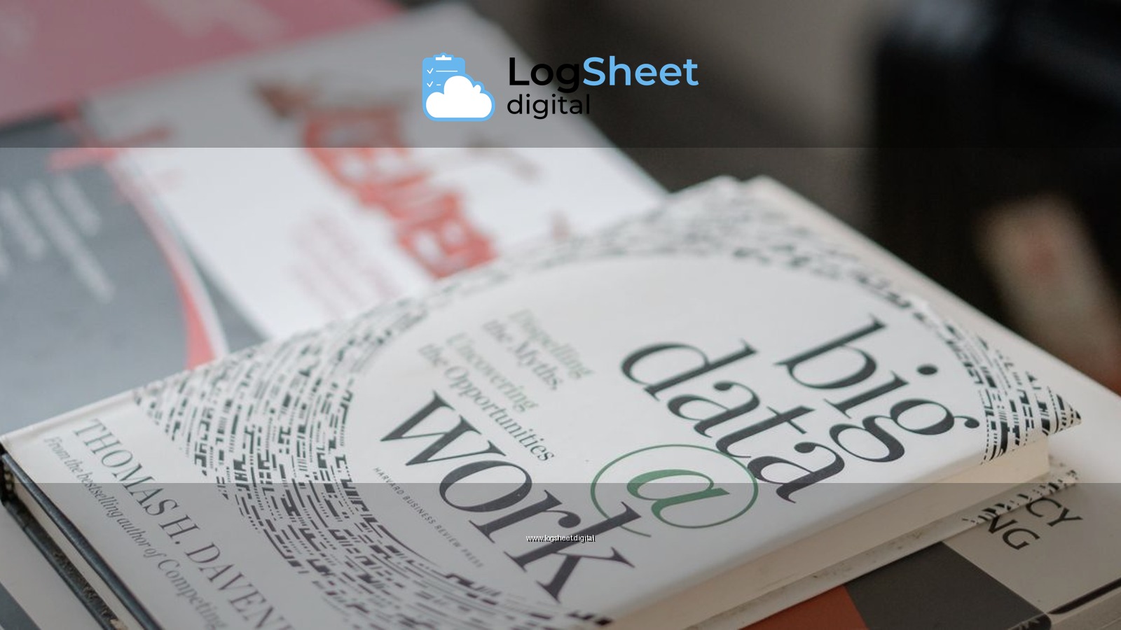 Close-up of books on data analytics and business strategies on a desk.