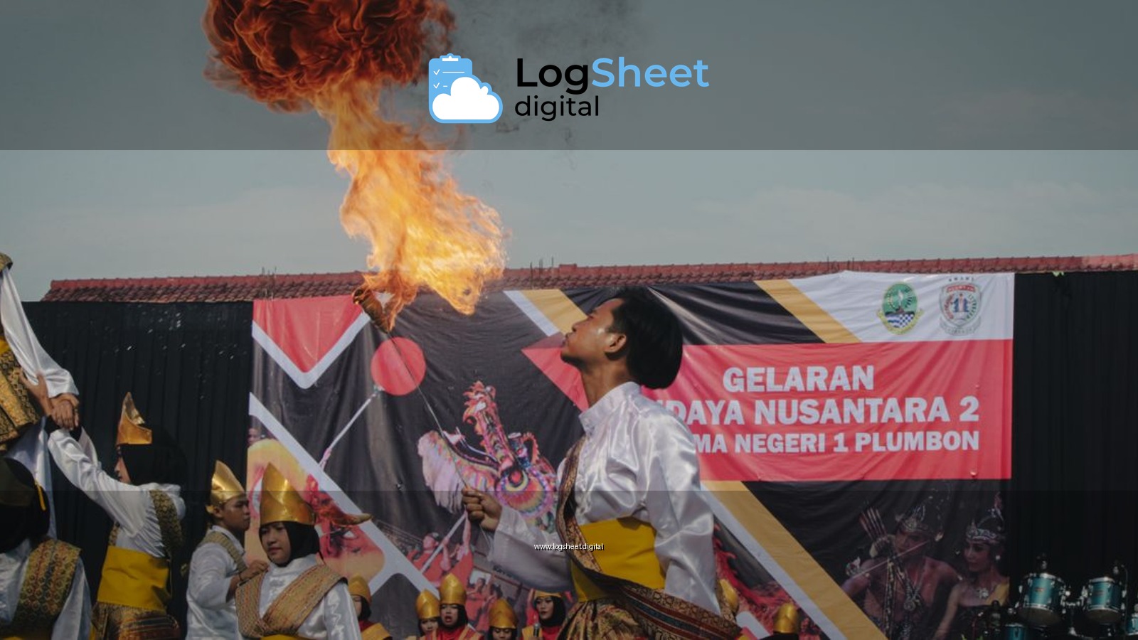 Vibrant cultural fire-spouting performance at a festival in Cirebon, Indonesia showcasing local tradition and skill.