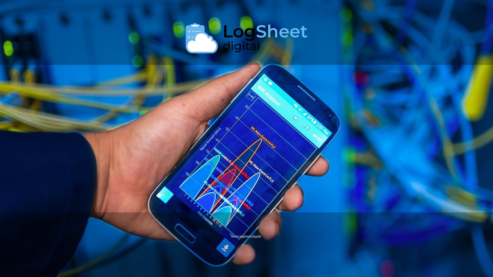 Hand holding smartphone displaying network analysis in high-tech server environment.