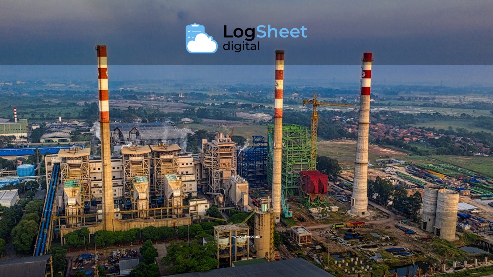 Aerial view of an industrial plant with smokestacks in Serang, Banten, Indonesia during daylight.
