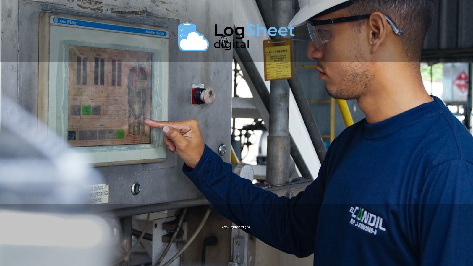 Engineer using control panel at industrial facility, ensuring operational efficiency.