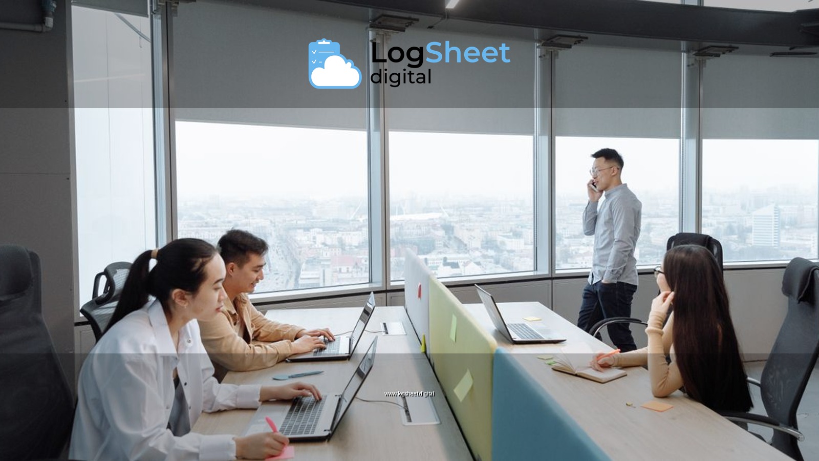 Business team working in a modern office setting with city view.