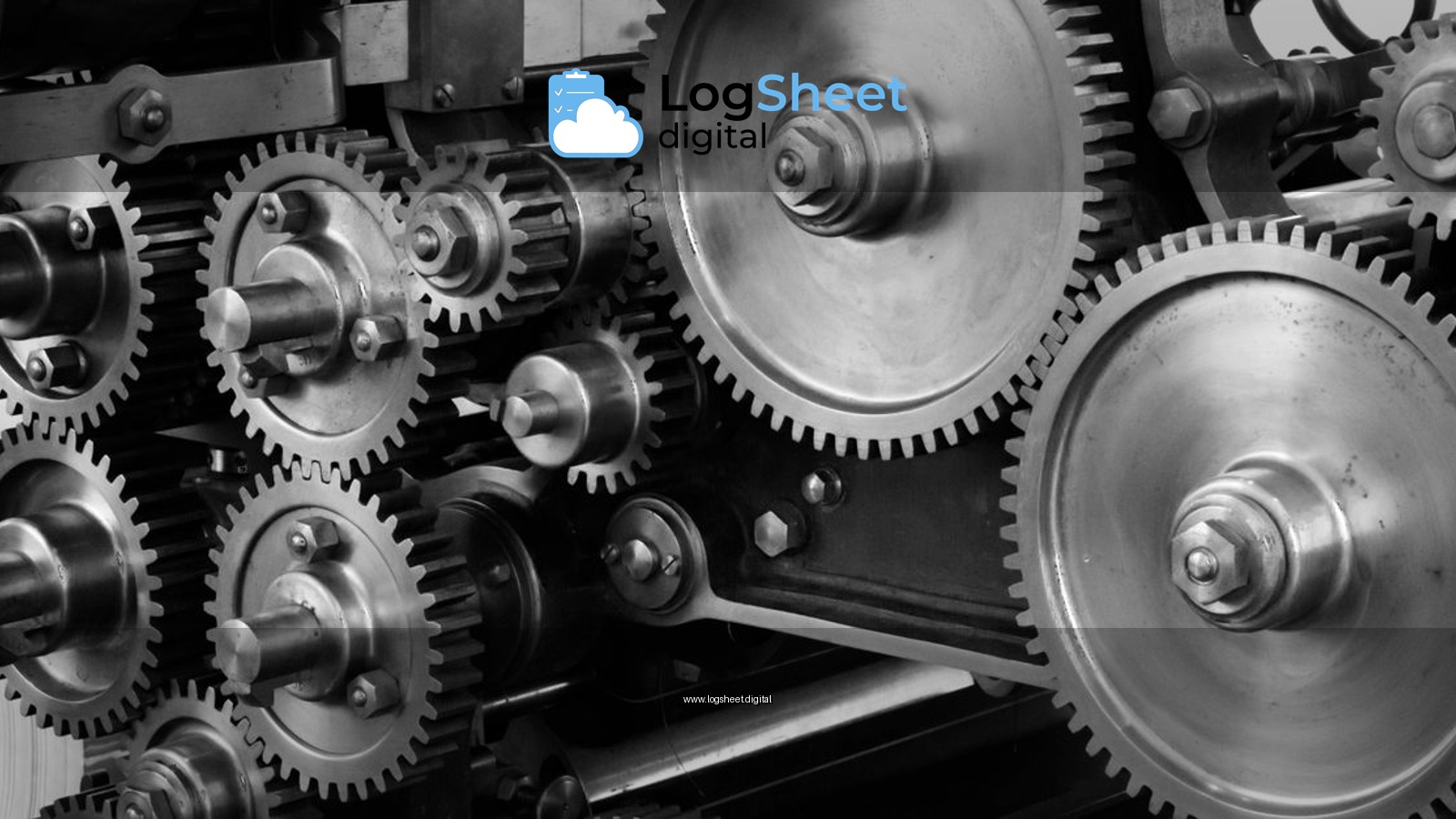 Close-up view of a complex industrial gear mechanism in black and white.