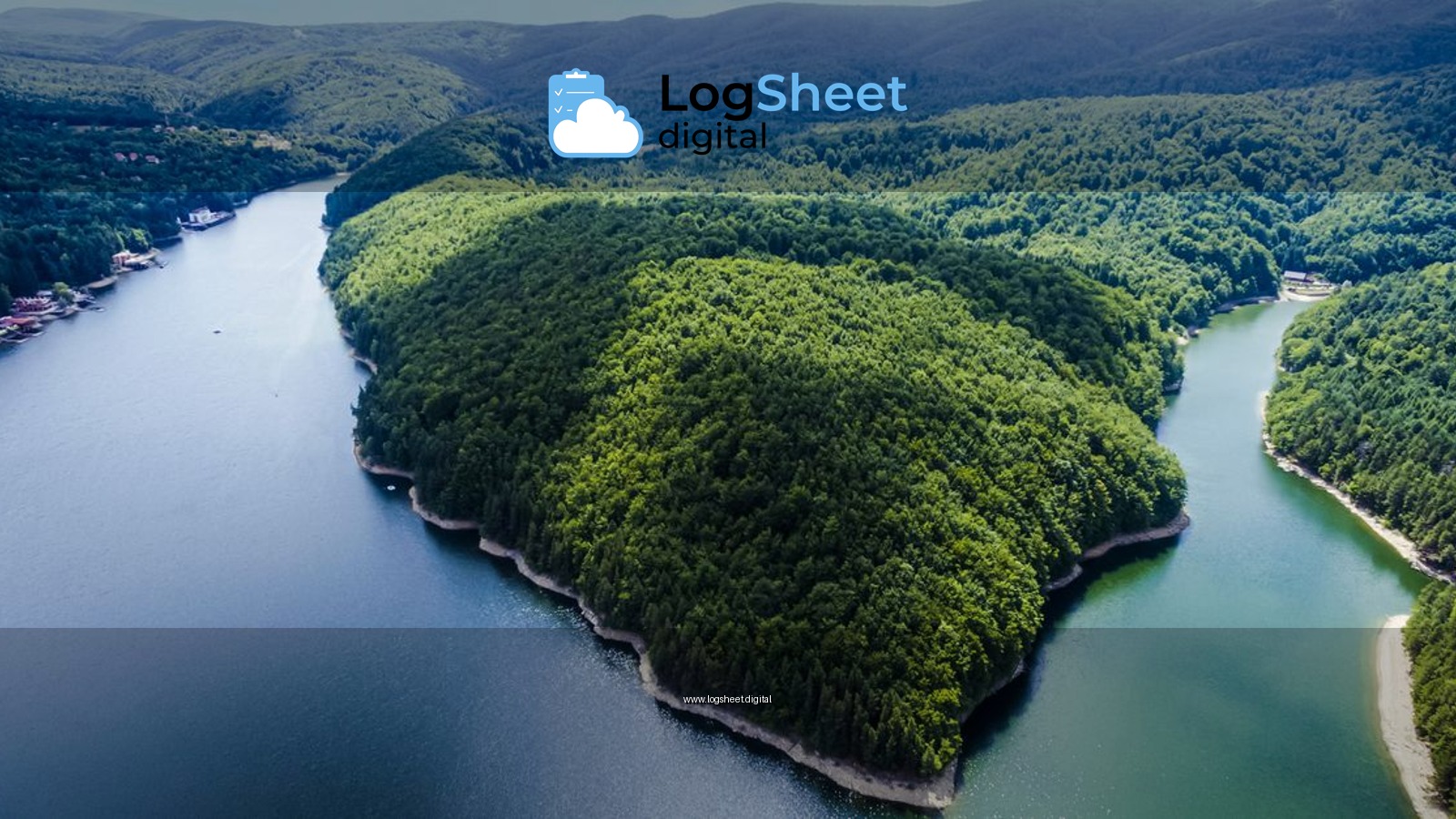 Stunning aerial view of Văliug Lake in Romania, showcasing lush greenery and serene waters.