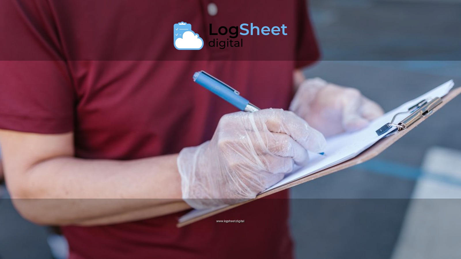 A person wearing gloves writes on a clipboard outdoors in casual attire.
