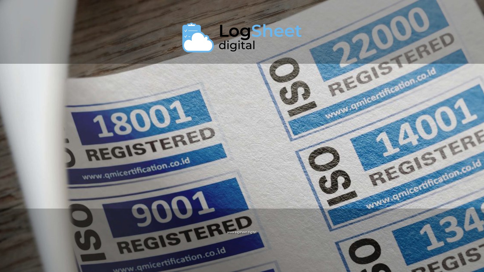 ISO certification stickers with registration numbers on paper.