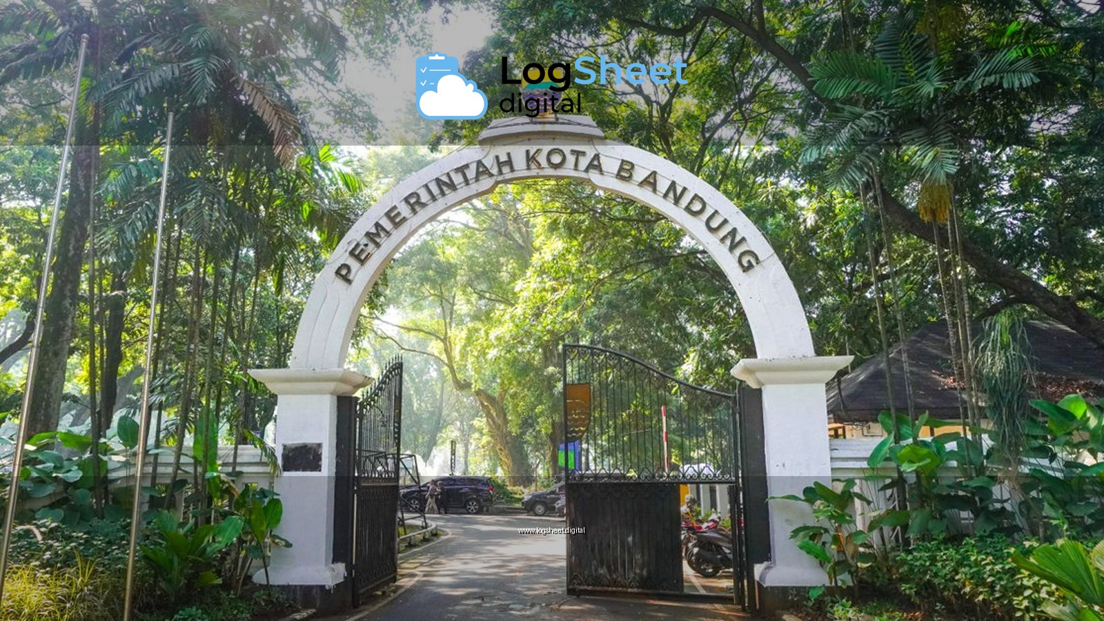 Scenic entrance arch to Bandung City Administration Park surrounded by lush greenery.
