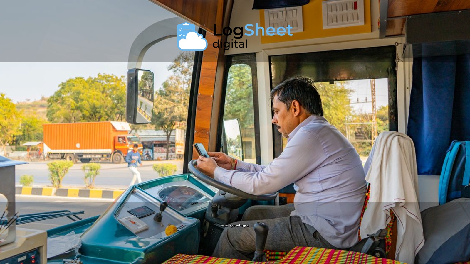 Bus driver looks at his phone inside the cabin while managing city traffic. Vibrant urban scene.