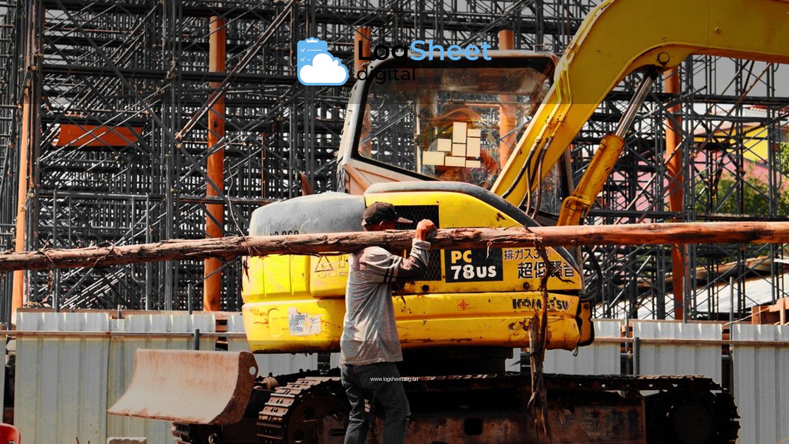 A construction worker manages logs with an excavator at a busy industrial site with scaffolding.