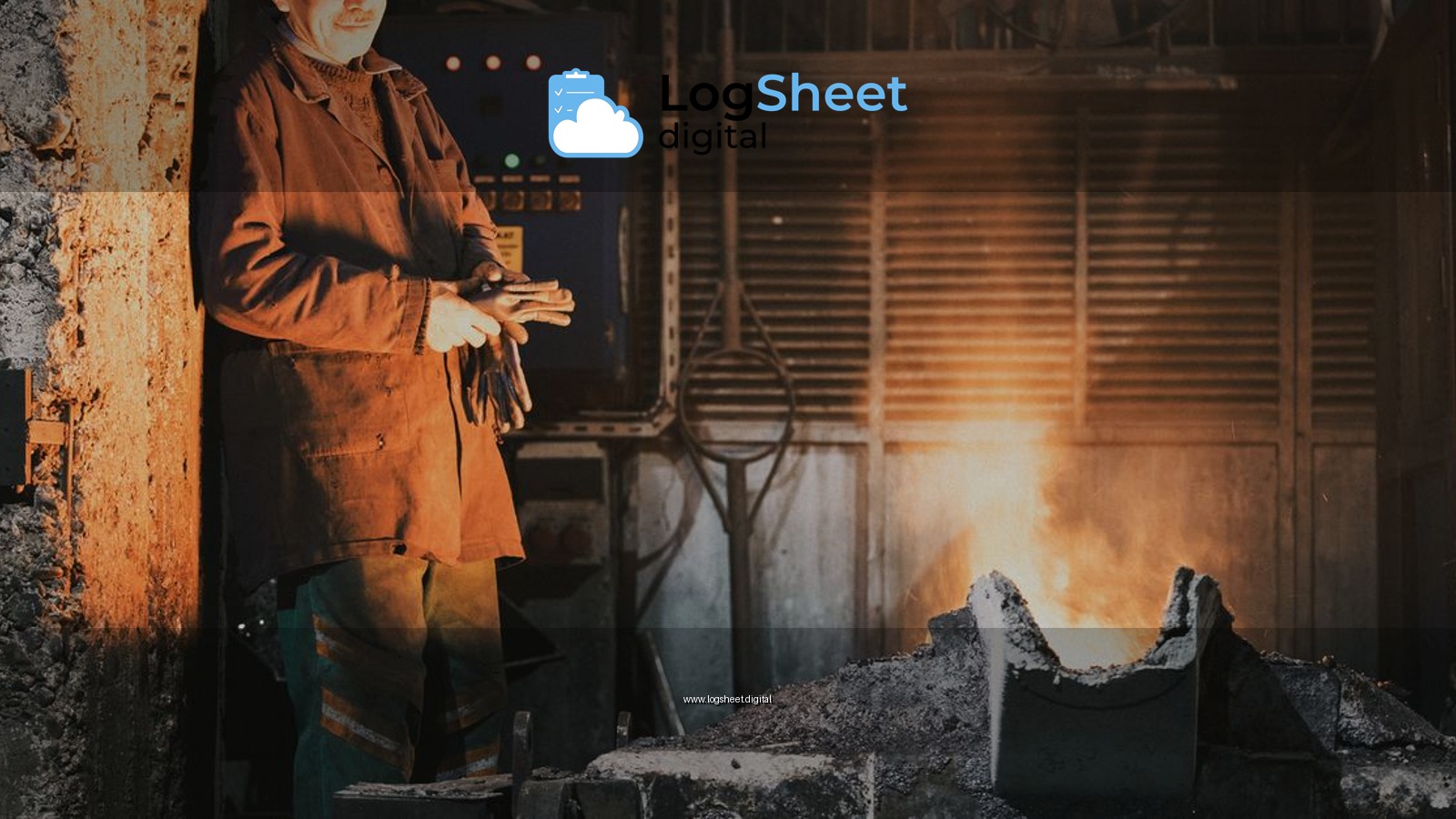 A seasoned worker stands by a furnace in an industrial foundry, casting a warm glow.