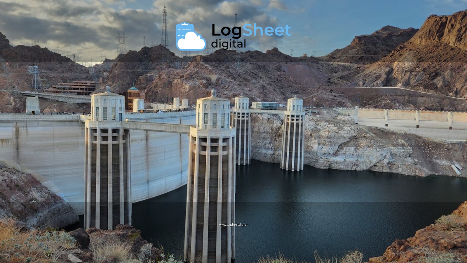 Stunning view of Hoover Dam showing the iconic structure and surrounding landscape under a partly cloudy sky.